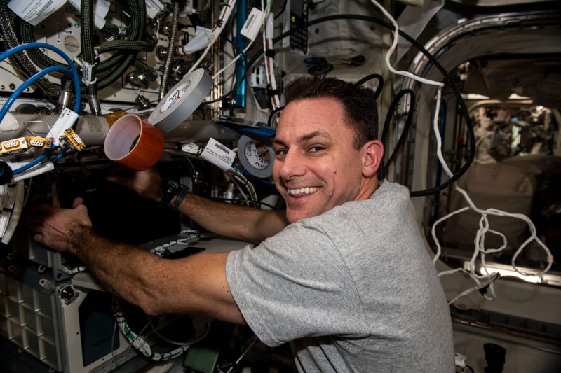 Caption: NASA astronaut Josh Cassada installs Redwire's 3D BioFabrication Facility on the ISS. (Credit: NASA)