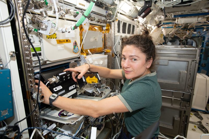 Caption: NASA astronaut works with Redwire’s Bone Densitometer on the ISS. (Credit: NASA)