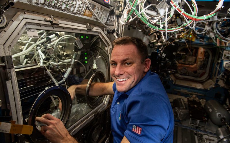 NASA astronaut Josh Cassada performing on-orbit activities with PFMI. (Credit: NASA)