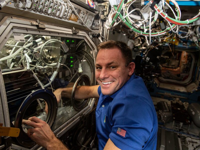 NASA astronaut Josh Cassada performing on-orbit activities with PFMI. (Credit: NASA)