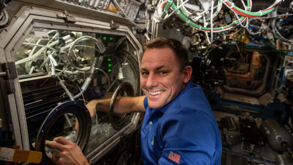 NASA astronaut Josh Cassada performing on-orbit activities with PFMI. (Credit: NASA)