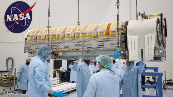 NASA and Boeing workers lift solar arrays into flight support equipment on April 2, 2021, in the Space Station Processing Facility at NASA’s Kennedy Space Center in Florida. The 63- by- 20-foot solar arrays will launch to the International Space Station later this year. They are the first two of six new solar arrays that in total will produce more than 120 kilowatts of electricity from the Sun’s energy, enough to power more than 40 average U.S. homes. Combined with the eight original, larger arrays, this advanced hardware will provide 215 kilowatts of energy, a 20 to 30 percent increase in power, helping maximize the space station’s capabilities for years to come. The arrays will produce electricity to sustain the station’s systems and equipment, plus augment the electricity available to continue a wide variety of public and private experiments and research in the microgravity environment of low-Earth orbit.
Most of the station systems, including its batteries, scientific equipment racks, and communications equipment have been upgraded since humans began a continuous presence on the orbiting laboratory in November 2000. For more than two decades, astronauts have lived and worked on this unique orbiting lab, supporting scientific research that has led to numerous discoveries that benefit people on Earth and prepare for future Artemis missions to the Moon and beyond.